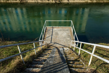 Stairs and platform on the river