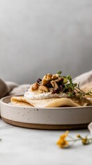 Golden pancakes with filling and cream cheese