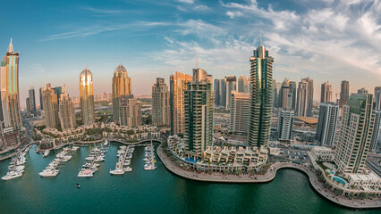 Obraz premium Aerial top view at sunset timelapse of Dubai Marina in Dubai, UAE