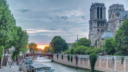 Sunset view of Cathedral Notre Dame de Paris timelapse in Paris, France.