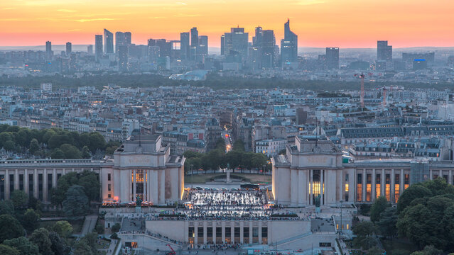 Aerial view over Trocadero day to night timelapse with the Palais de Chaillot seen from the Eiffel Tower in Paris, France. - Powered by Adobe