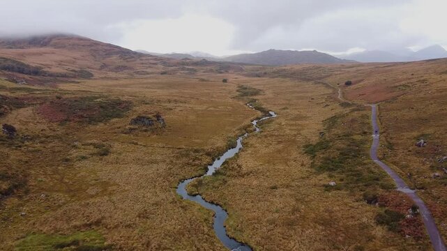 Flight over Torc river near Muckross Lake, Killarney, Ireland