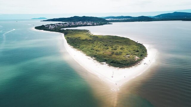 Aerial view of the sandy beach named Daniela located on the north of Santa Catarina island, Florianopolis, Brazil