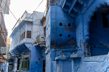 indian blue city crowded street at morning from flat angle