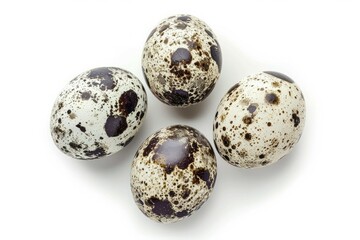 Obraz premium Cluster of speckled quail eggs on white background. Artificial intelligence image