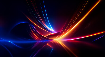 Fototapeta premium Abstract image featuring dynamic, curved light trails in vibrant shades of blue, orange, and red against a dark backdrop, creating a sense of movement and energy.