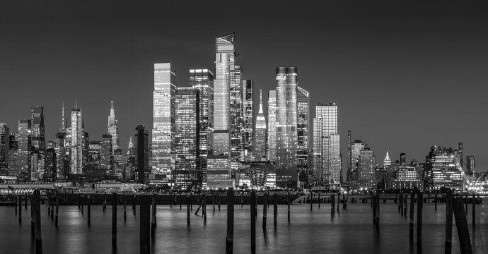 Fototapeta New York City Hudson Yards skyscrapers at twilight in Black & White. Midtown West Manhattan cityscape from across the Hudson River
