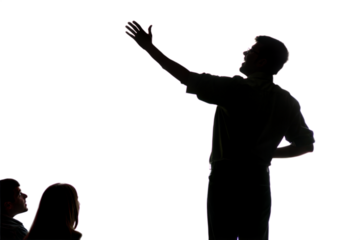 Silhouette of a Man Giving a Presentation