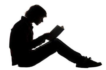 Silhouette of a Young Man Reading