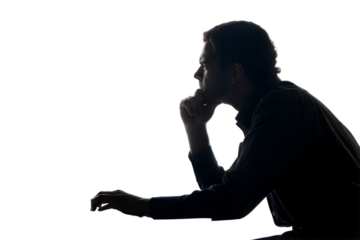 Silhouette of a pensive man