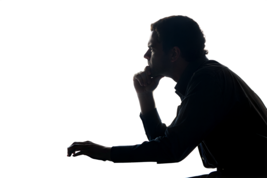 Silhouette of a pensive man