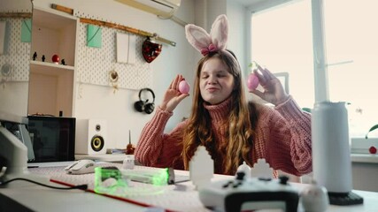 Young gamer embraces Easter season while playing in stylish gaming corner. Neon lights, festive mood, and joyful expressions highlight warm, friendly, and tech-savvy holiday ambiance. - Powered by Adobe