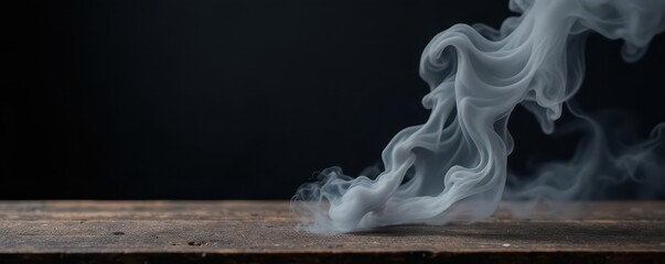 Dark wooden tabletop, wisps of grey smoke rise, deep black background, shadows, grain