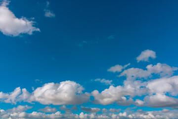Clouds and blue sky. Partly cloudy sky backdrop photo.