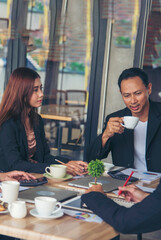 Vertical Horizon Close up hands group of Business People meeting in conference room pointing financial document. Vertical business team brainstorming partner teamwork. Close up hand team meeting