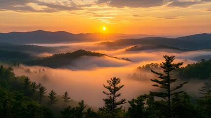 Naklejka premium Golden sunset light bathes misty mountain landscape, with amber fog flowing between peaks, warm gradient sky, and ethereal cloud sea in cinematic, minimalist scene of dramatic beauty.