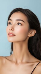 Fototapeta premium A woman with long black hair and a beautiful face