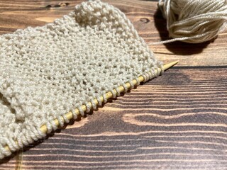 Process of knitting craft handmade hobby clew and needles	
