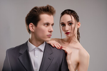 Couple showcasing beauty and intimacy in a sophisticated setting