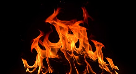 Burning Brightly, An intense display of orange flames against a dark background