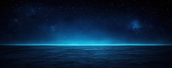 Obraz premium Dramatic nighttime abstract background idea. A tranquil blue ocean horizon under a starry night sky, evoking calmness and serenity.