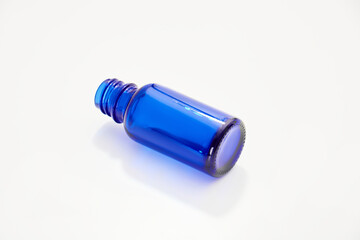 Blue glass jar without logos for mockups of medicines, vitamins, cosmetics