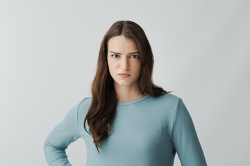 Upset disgusted woman staring at camera