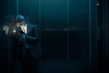 Panicked man stuck in the lift © StockPhotoPro