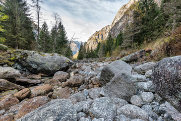 autumnal landscape inside Val di Mello, Sondrio, Italy