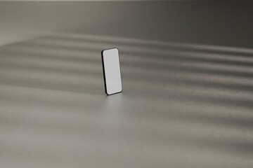 Mockup smartphone on grey studio floor. Hit by sunlight. Use as template for UX designs, websites, ads, and more