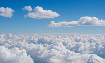 Fototapeta premium Scenic aerial view capturing fluffy clouds floating in a blue sky