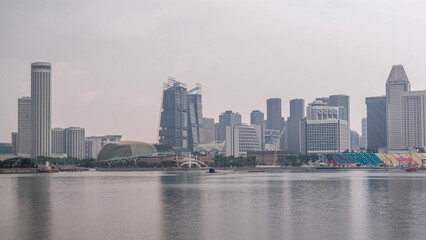Naklejka premium Skyline with skyscrapers of Marina Bay timelapse hyperlapse.