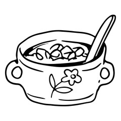 bowl of soup in a floral patterned cup.