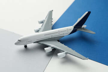 One plane model on color background, closeup