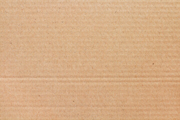 Fototapeta premium Cardboard sheet texture background, detail of recycle brown paper box pattern.
