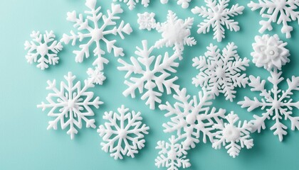 White snowflakes on teal background