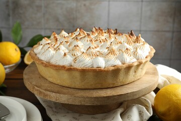 Delicious meringue pie on table indoors, closeup