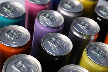 Many aluminium cans of beverage as background, closeup