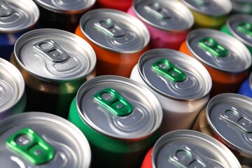 Many aluminium cans of beverage as background, closeup