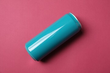One tin can on pink background, top view