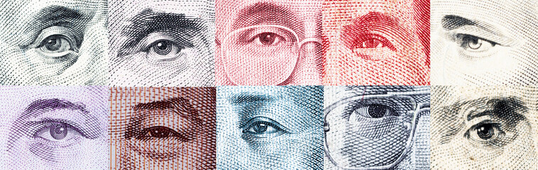 Eyes of international banknotes  include dollar baht dong  yuan yen euro won pound sterling for money transfer and  currency exchange forex  concept.