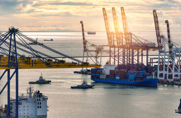 Logistics and transportation of container cargo ship at ship port. Container truck and crane bridge...