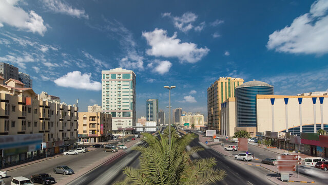 Road traffic in Ajman, view from bridge at day timelapse hyperlapse