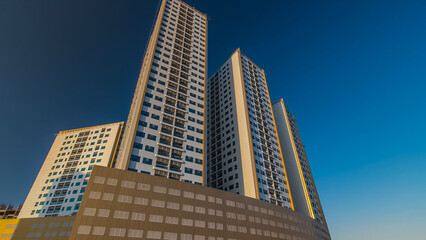 Obraz premium Modern new towers in Ajman timelapse hyperlapse. Cityscape of Ajman.