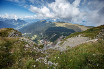 Fototapeta premium Breathtaking views of the Dolomites near Seceda, Sankt Christina, and Sankt Ulrich during a clear summer day
