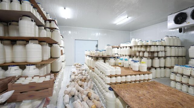Cheese aging and storage barrels made of plastic,commonly used in dairy industries for efficient preservation and transportation.Ideal for maintaining quality, freshness in cold storage facilities.