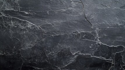 Black stone with grey cement texture, clean and minimal flat lay composition, conveying simplicity and modern elegance.