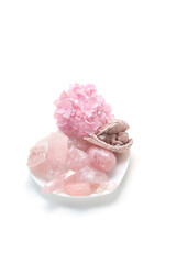 sleep angel figurine, gemstone minerals and hydrangea flowers on light background. magic ritual...