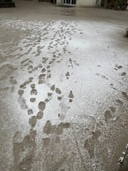 Pavement with footprints