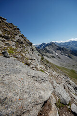 Breathtaking panoramic view of the Ahorn mountainside in Mayrhofen, Austria, showcasing rocky terrain and distant alpine peaks